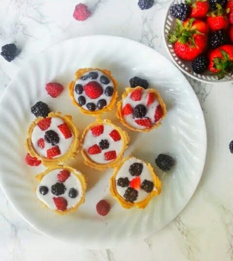 These Gluten-free Grain-free mini fruit tarts are perfect desserts for 4th of July or any allergy friendly party.There are AIP compliant, autoimmune protocol friendly, grain free, dairy free, egg free, soy free, corn free, peanut free. They are Paleo, Vegan, Whole30 friendly. #aip #aipdessert #top8free #autoimmuneprotocol #glutenfreefruit tarts #fruittarts #allergyfriendly #glutenfreedessert #glutenfreevegan #dairyfree #dairyfreedessert #vegandessert #eggfree #dairyfreeeggfree #whole30dessert #paleodessertidea #4thofjuly #4thofjulydessert #healthydessert #summerdessert