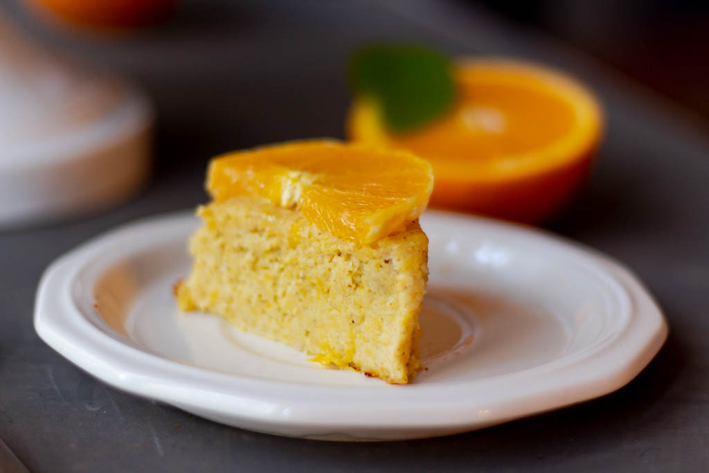 This Almond Orange Cake is delicious, moist, and gluten-free, flourless, grain-free, and paleo. It's the easiest allergy-friendly cake to make. It's dairy-free and healthy, perfect for a gluten-free Christmas cake or birthday cake or Mother Days cake.