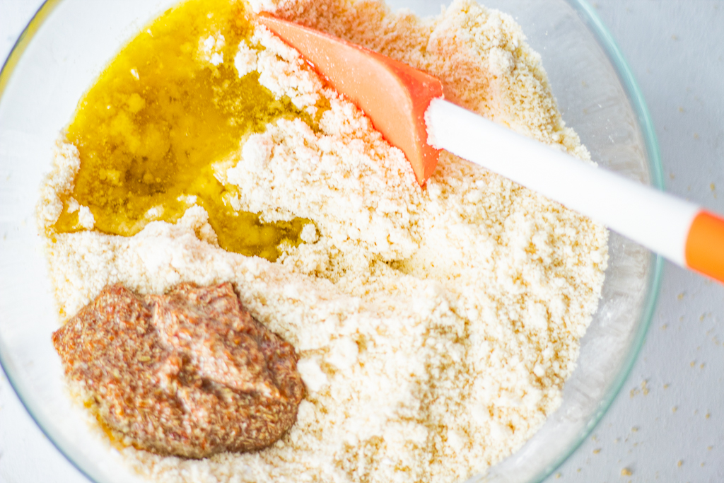 the bowl with flour and sugar and with flax egg and olive oil added to it