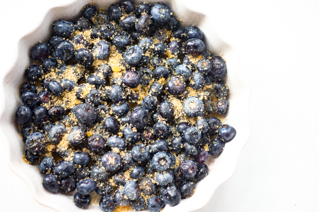 Pie plate with blueberries covered with Turninado sugar